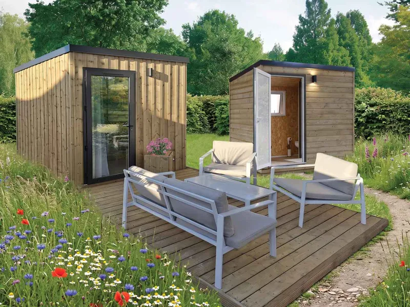 Espace composé d’un hébergement compact Escapade et d’un sanitaire individuel Escale Nature